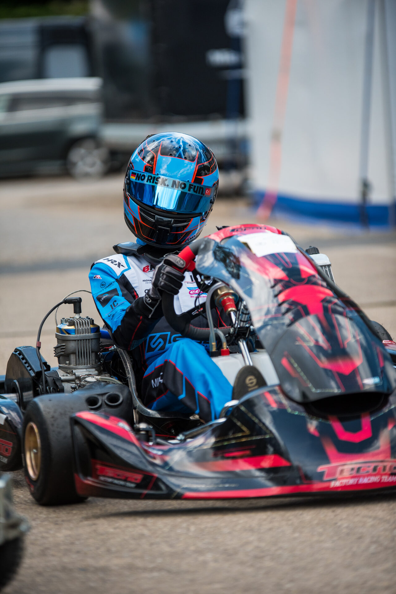 Miraç Yıldırım in racing helmet and suit